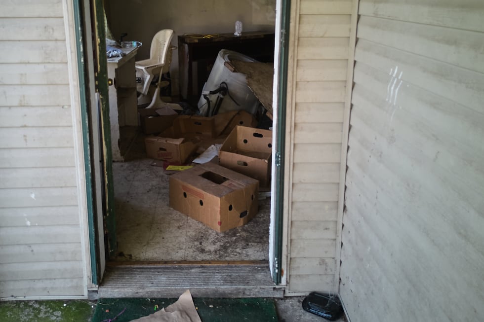 Items including a high chair are seen in a home where authorities say they removed 16 children...