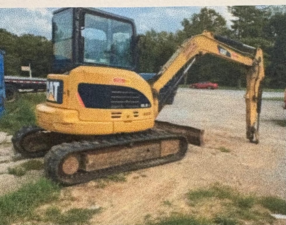 "The excavator is described as a 2011 Caterpillar 305.5 DCR, yellow and black in color,"...