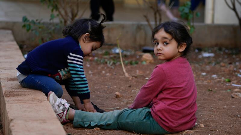 Displaced children, who fled Baalbek city and the nearby towns of Douris and Ain Bourday with...