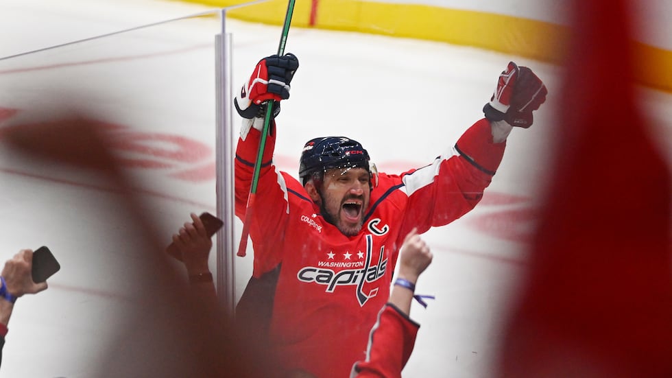 FILE -- Washington Capitals left wing Alex Ovechkin (8) celebrates his 900th NHL career goal.