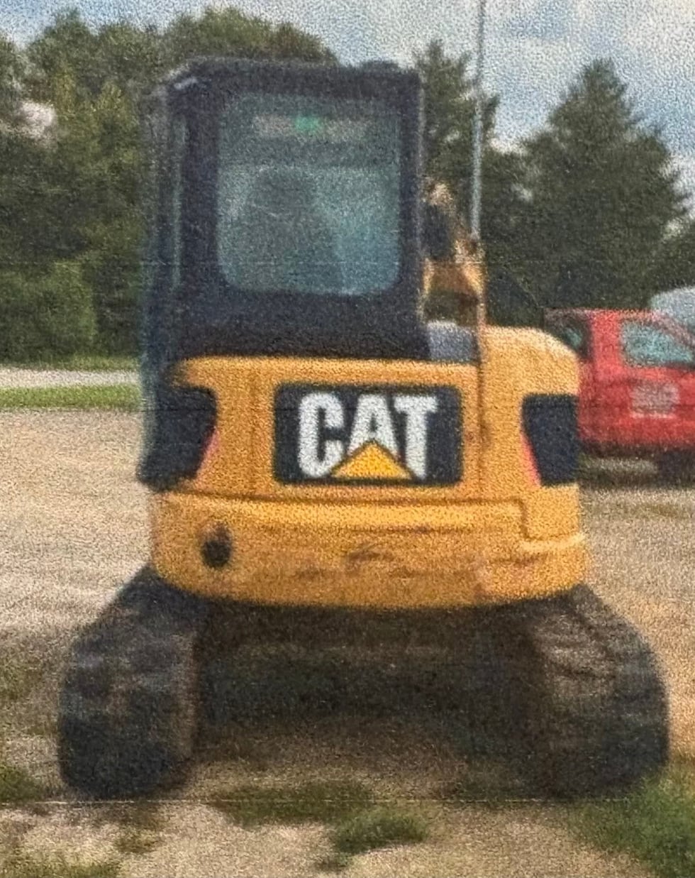 Police say the excavator was taken from a family farm located in the 1500 block of Fairgrounds...