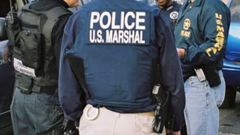 FILE -- U.S. Marshals Service agents shown in an undated image.