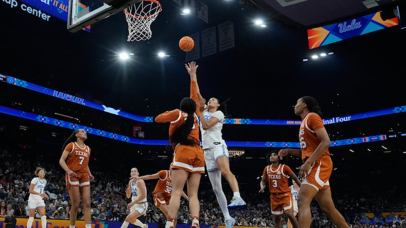 UCLA center Lauren Betts (51) shoots against Texas during the first half of a women's NCAA...