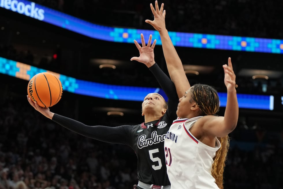 South Carolina guard Tessa Johnson (5) shoots over UConn forward Sarah Strong (21) during the...