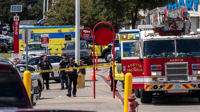 Law enforcement investigates a shooting at Target off Research Boulevard, near Ohlen Road in...