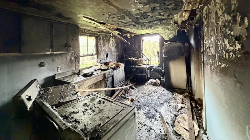 Crews say they were met by a resident who said the fire was in the kitchen.